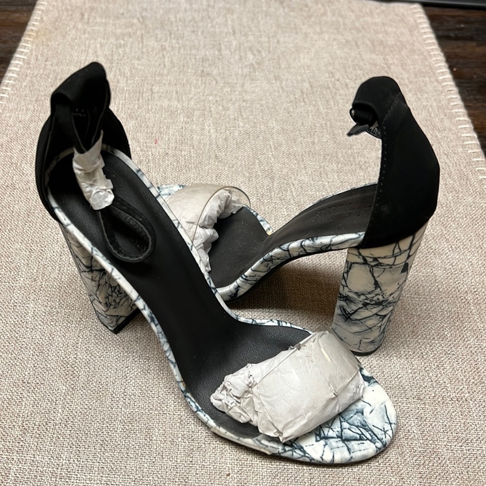 Never worn Charlotte Russe size 8 Black and White Marble heeled scandal